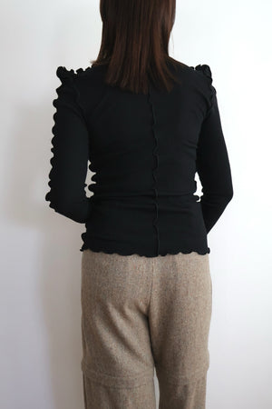 Pointed Shoulder Tops